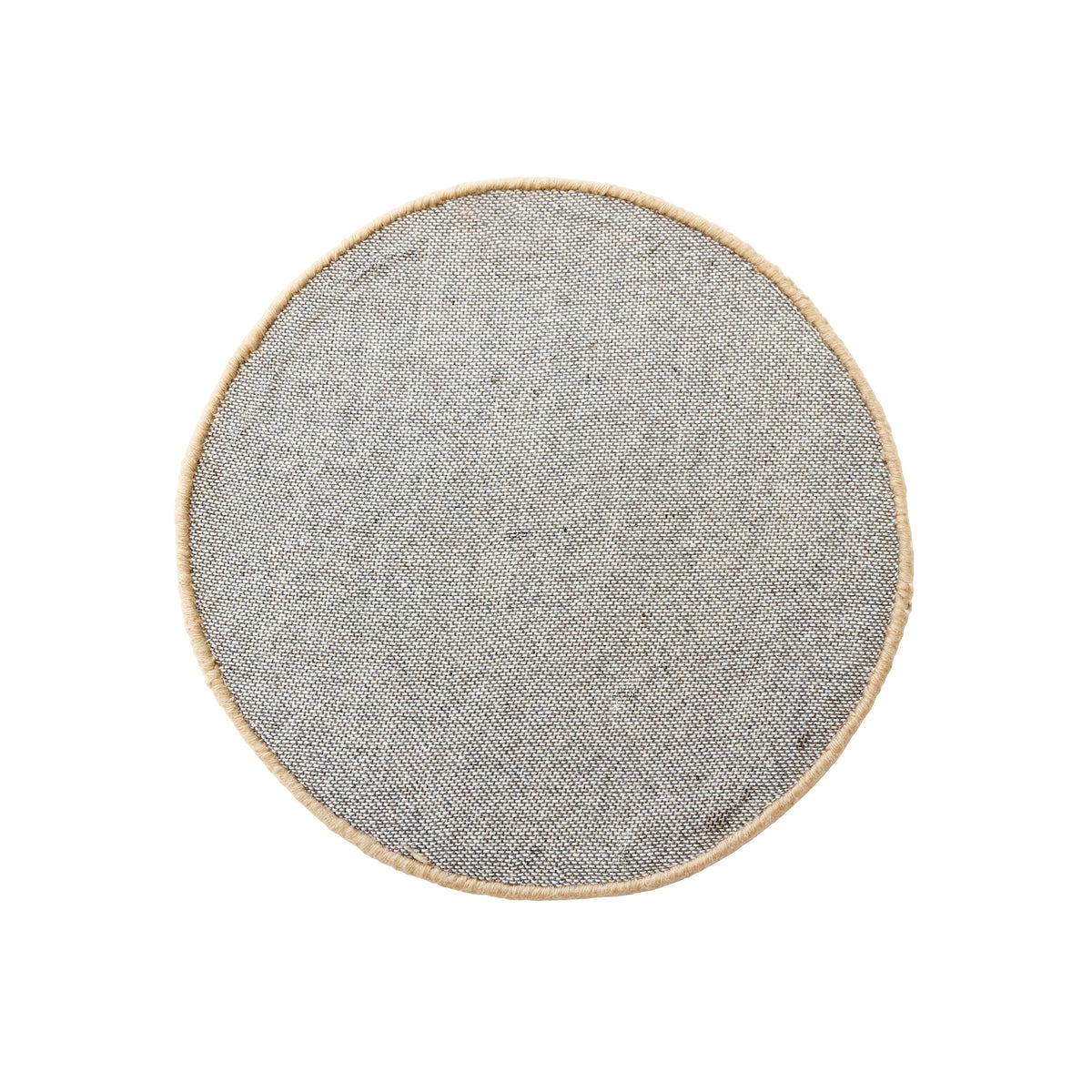 Side angle view of camel smiley face wool kids rug showing its round shape, plush 12-15 mm hand tufted pile and playful cartoon design.