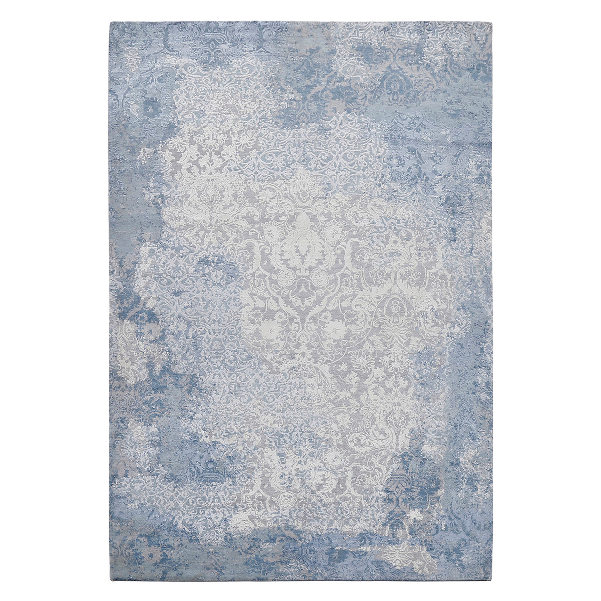 Frost blue distressed damask hand knotted wool and viscose rug with silver-grey ornamental detailing