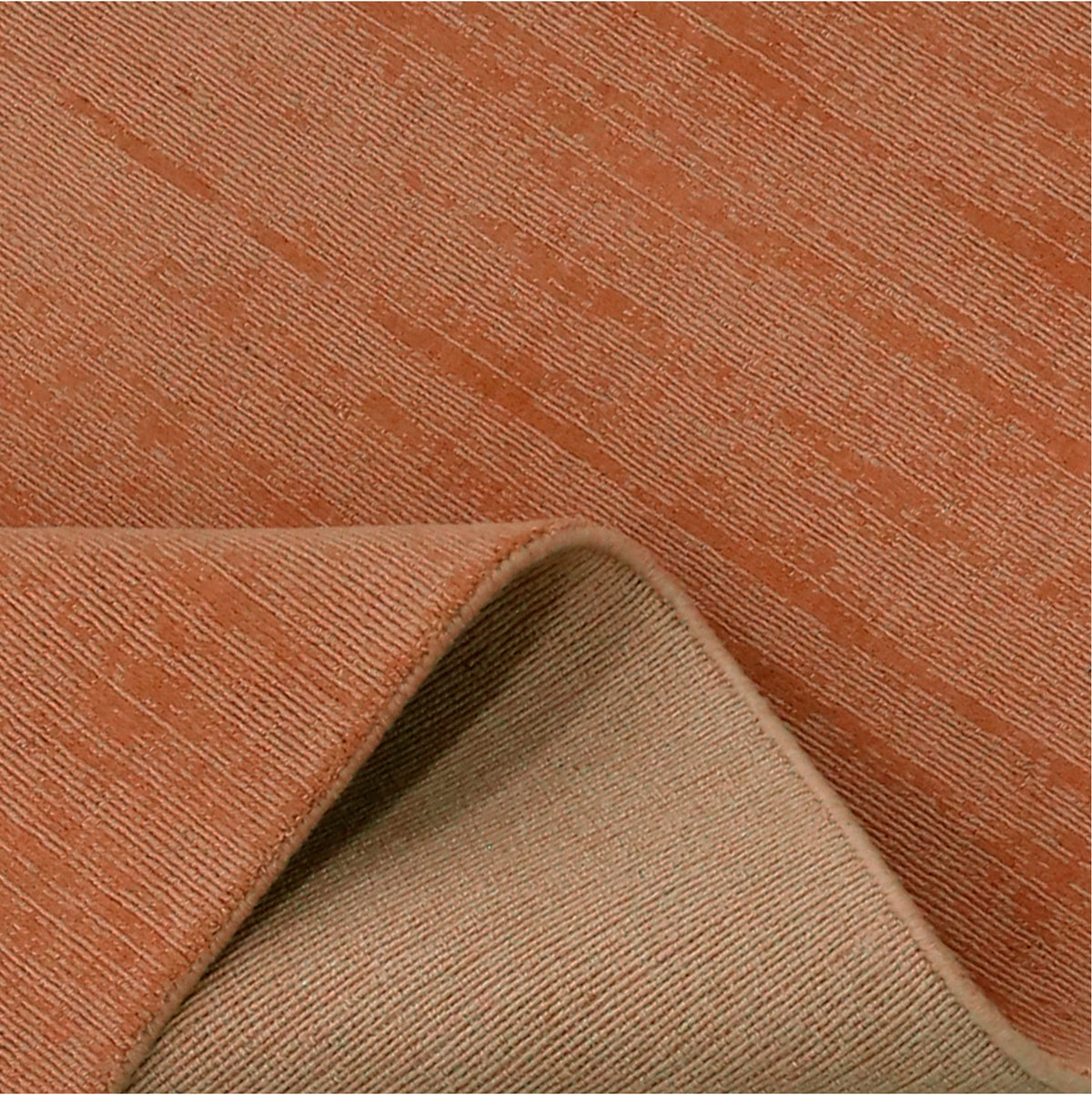 Close-up of light pink Hand Woven Loom Lori wool rug highlighting its soft 12–15 mm pile, fine wool texture and understated surface variations.