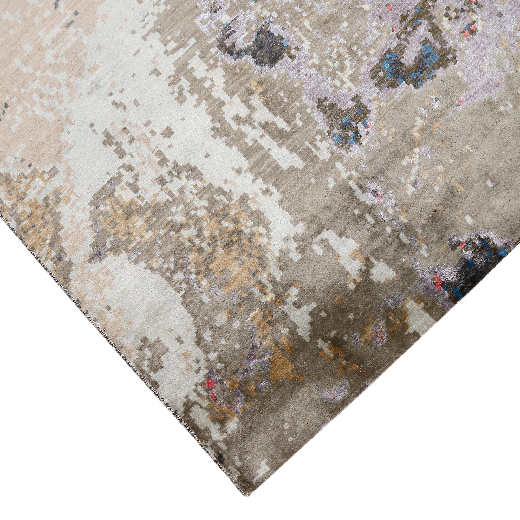 Hand-finished edge and layered abstract surface of the Noir Blush hand knotted modern rug
