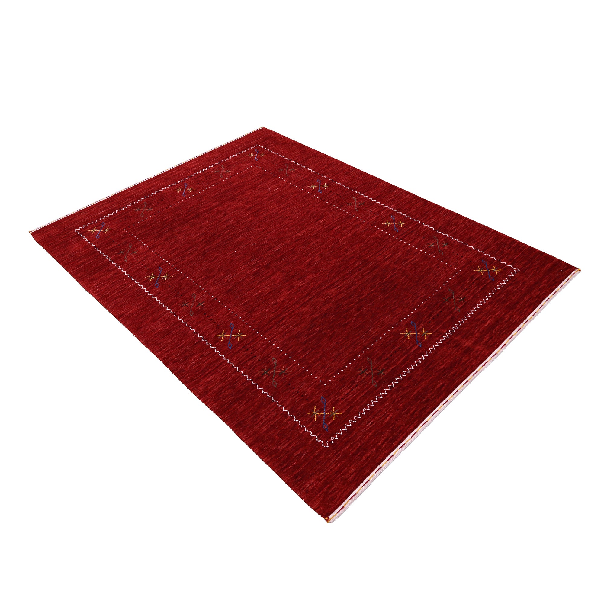 Side angle view of red Hand Woven Loom Lori wool rug highlighting natural wool texture, minimal floral pattern and handmade finish