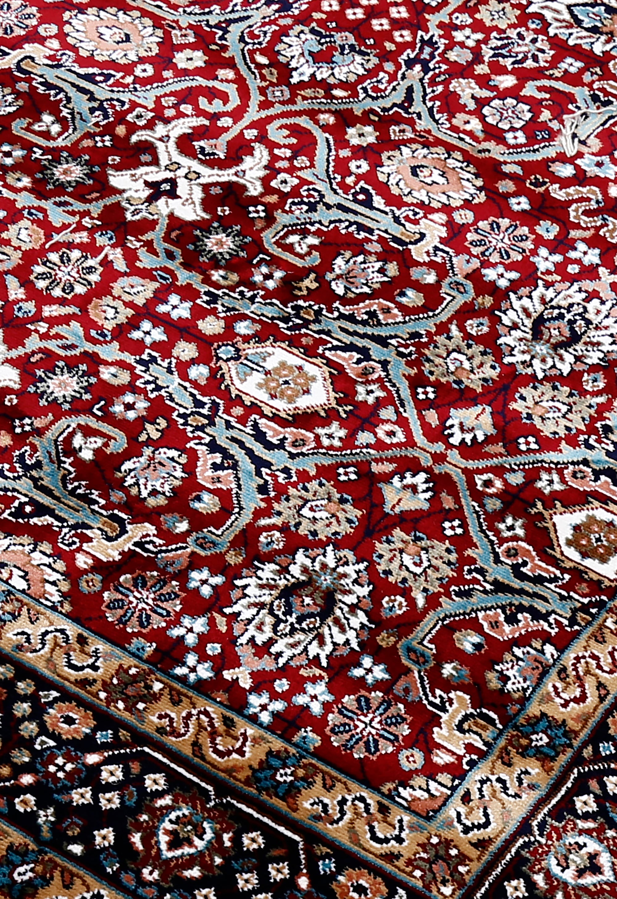 Close-up texture of Red Machine Woven Classic Art Silk Rug showing intricate floral motifs and smooth Art Silk surface