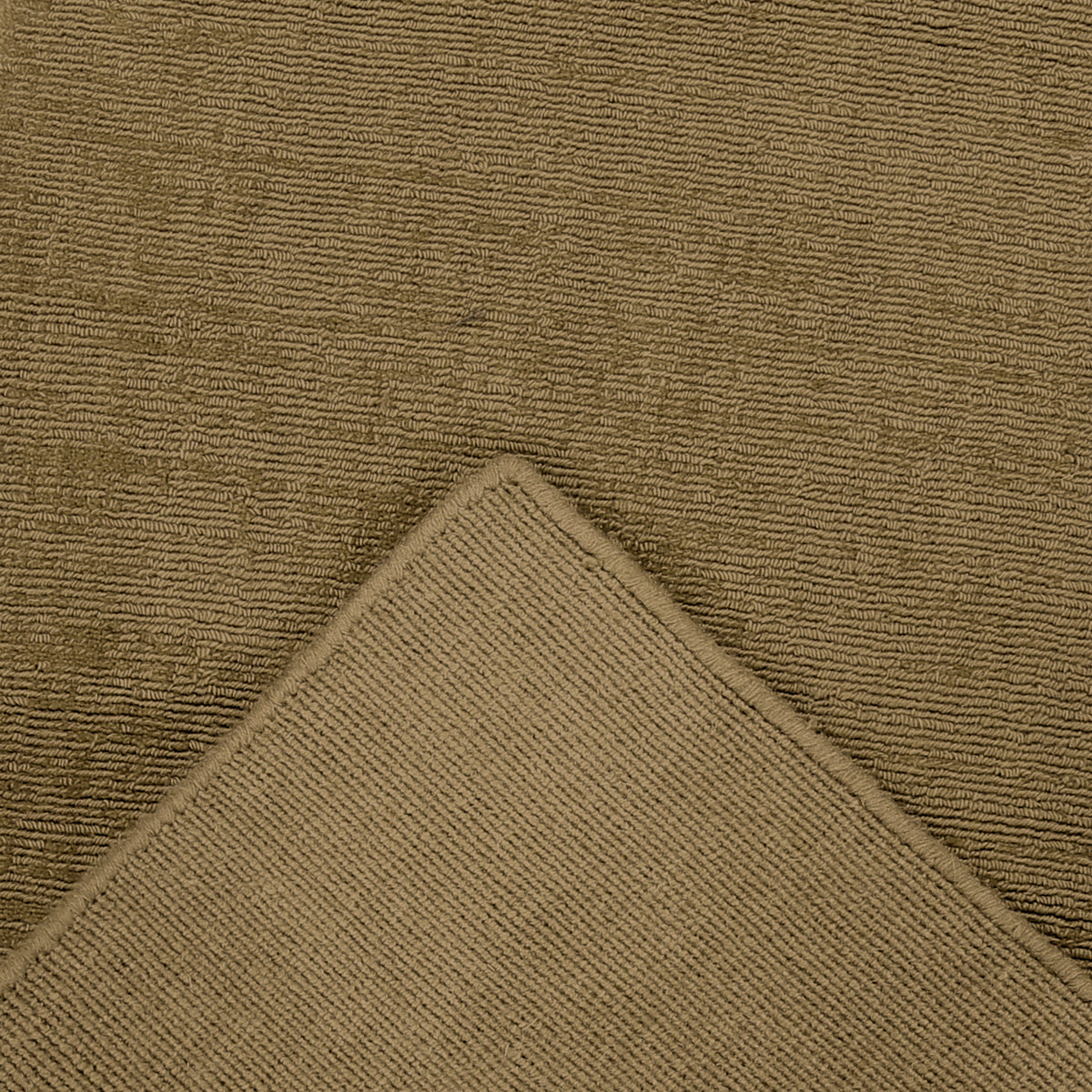 Close-up of Beige Loom Lori wool runner rug showing the handcrafted surface, bound edge and woven underside construction.