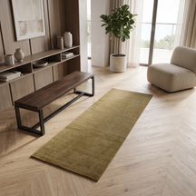 Beige Hand Woven Loom Lori wool runner rug styled in a modern hallway with wooden flooring, neutral furniture and natural light.