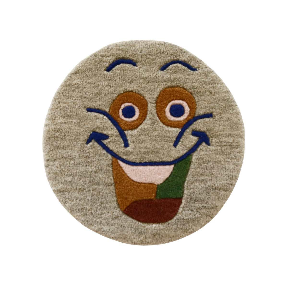 Full view of beige round hand tufted wool kids rug featuring a playful smiley face with navy blue, brown, cream and green details.