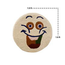 Close-up of beige smiley face hand tufted wool kids rug highlighting its soft wool texture, plush pile and raised colourful facial details.