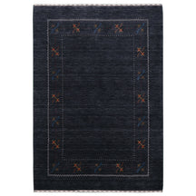 Full view of black Hand Woven Loom Lori wool rug with multicolour floral motifs and delicate geometric border