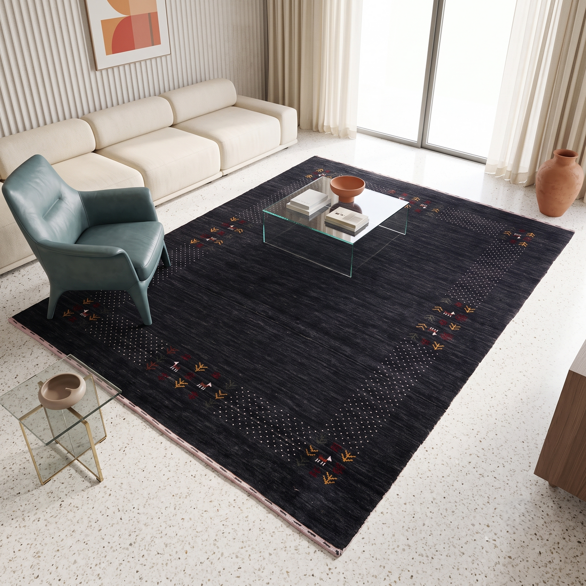Charcoal black Hand Woven Loom Lori wool rug with ivory dotted folk border styled in a sophisticated contemporary living room