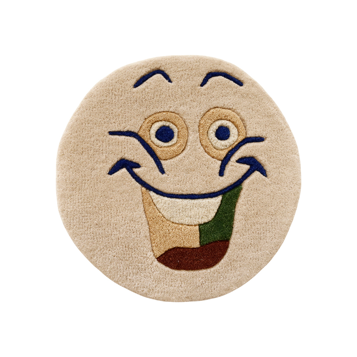Full view of cream round hand tufted wool kids rug featuring a cheerful cartoon face with navy blue, beige, ivory, green and rust details.