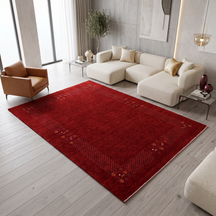 Crimson red Hand Woven Loom Lori wool rug with ivory dotted tribal folk border styled in a warm contemporary living room