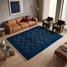 Deep navy blue Hand Woven Loom Lori wool rug with central multicolour tribal grid motifs styled in an elegant living room