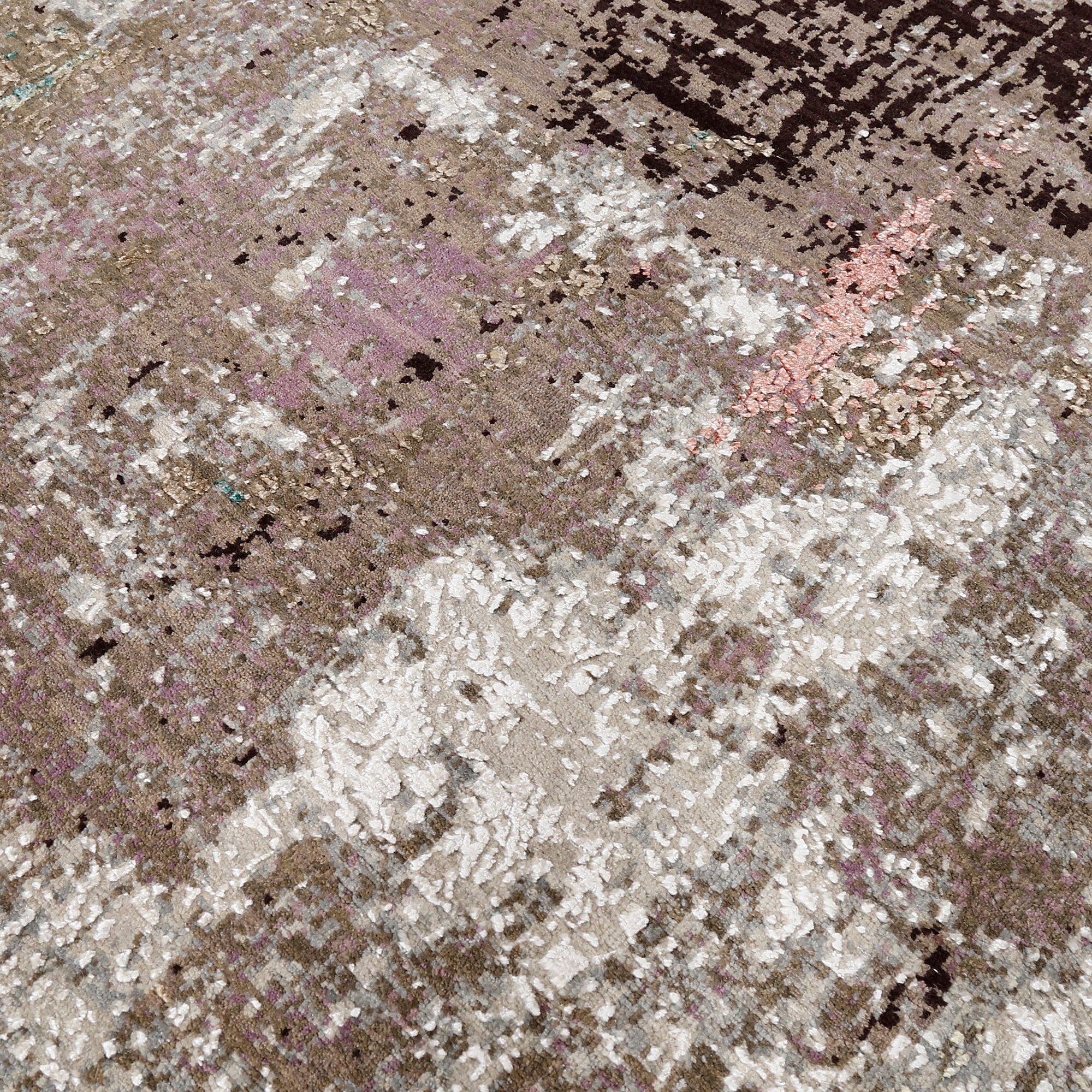 Close-up of the hand knotted wool and viscose texture with beige taupe blush aqua and blue abstract detailing