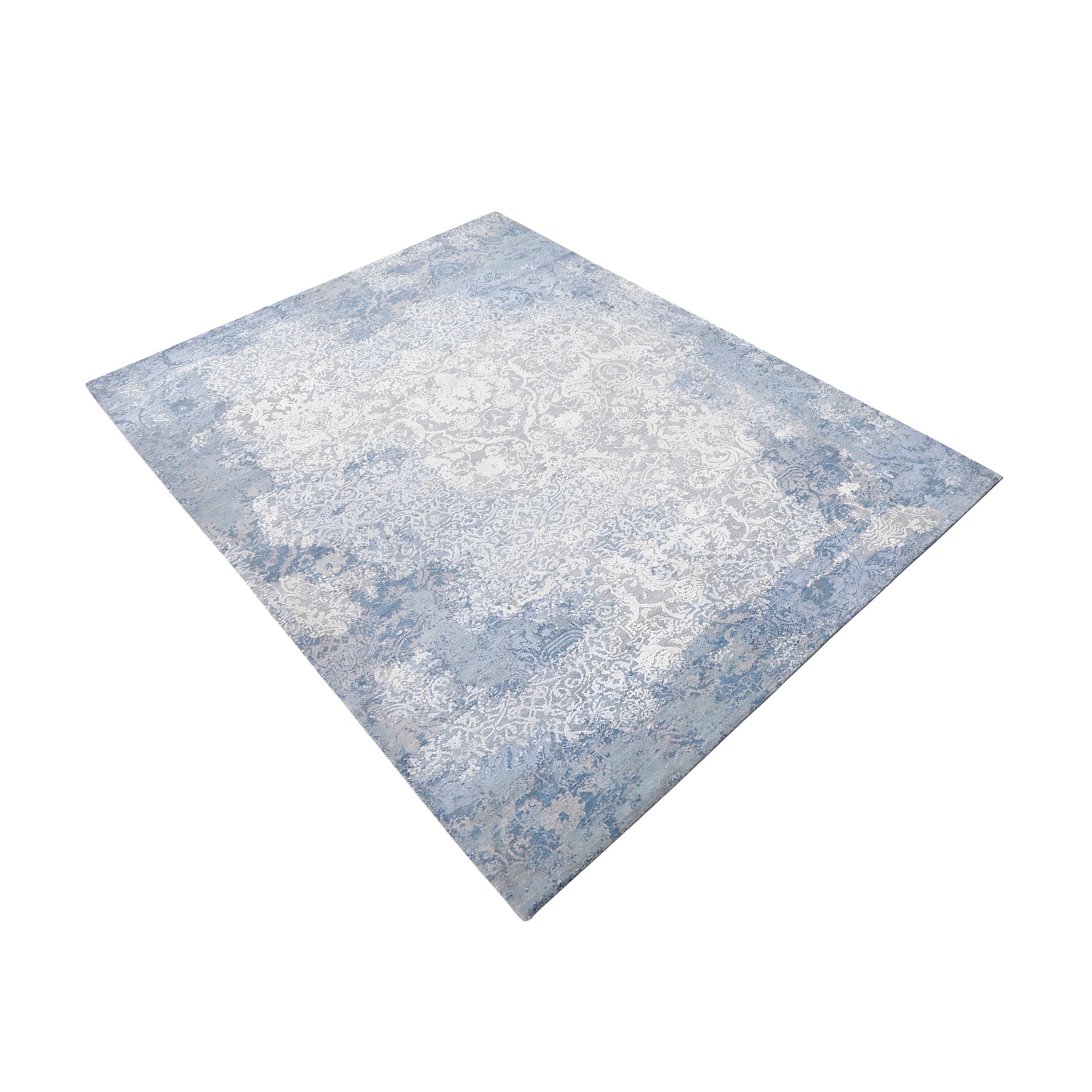 Frost blue distressed damask hand knotted wool and viscose rug with silver-grey ornamental detailing