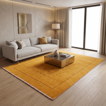 Golden mustard Hand Woven Loom Lori wool rug with scattered tribal motifs and zigzag border styled in a warm living room