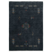 Full view of charcoal black Hand Woven Loom Lori wool rug with central diamond medallion and geometric folk motifs