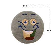 Close-up of grey smiley face hand tufted wool kids rug highlighting its soft wool texture, plush pile and raised colourful facial details.