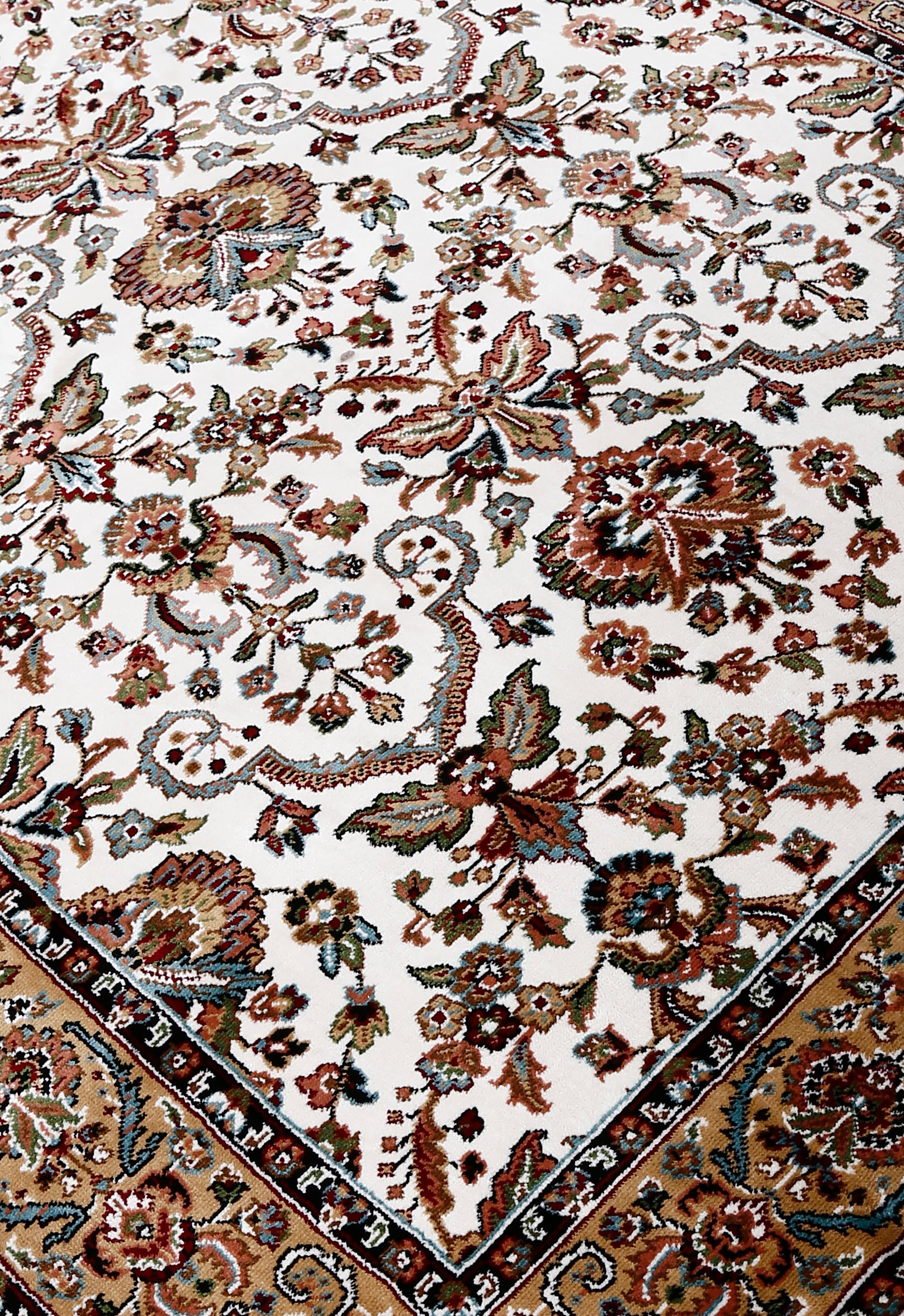 Close-up texture of Ivory Machine Woven Classic Art Silk Rug showing intricate floral motifs and smooth surface