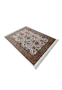Side angle view of Ivory Floral Machine Woven Classic Art Silk Rug by Khushi Living