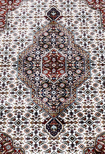 Close-up texture of Ivory Machine Woven Classic Art Silk Rug showing intricate geometric motifs and smooth Art Silk surface