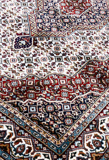 Close-up texture of Ivory Machine Woven Classic Art Silk Rug showing intricate geometric motifs and smooth Art Silk surface