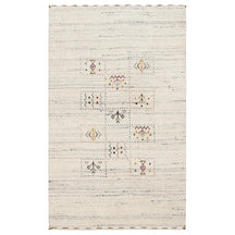 Full view of ivory cream Hand Woven Loom Lori wool rug with grey-blue striations and central geometric folk motif panels