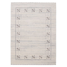 Full view of ivory Hand Woven Loom Lori wool rug with grey striations, floral motifs and geometric border detailing