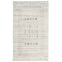 Full view of ivory Hand Woven Loom Lori wool rug with grey striations and earthy tribal geometric motifs