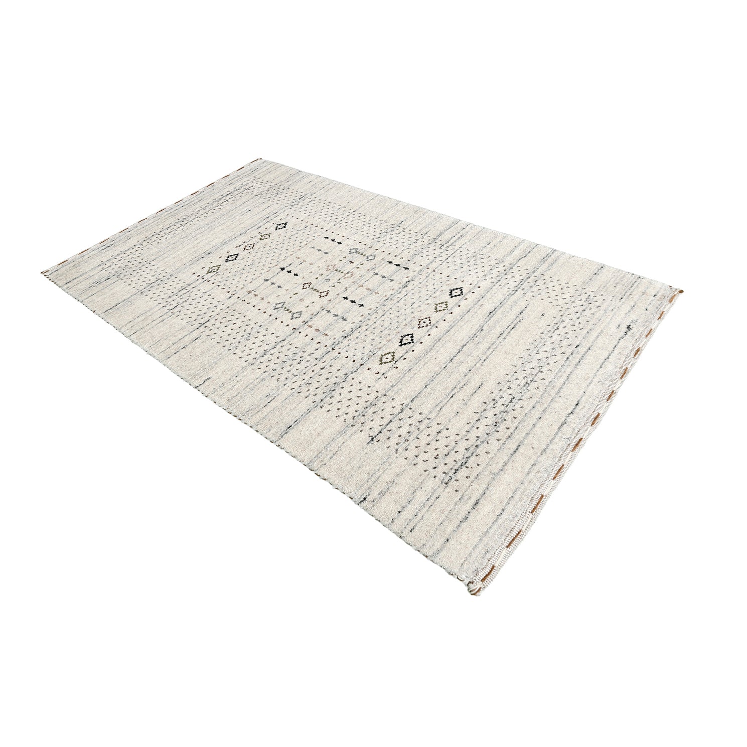 Side angle view of ivory Hand Woven Loom Lori wool rug highlighting natural wool texture, subtle tribal pattern and handmade finish