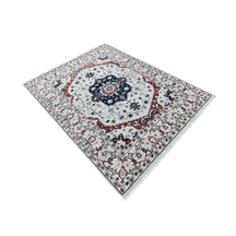 Ivory hand knotted traditional wool rug with navy medallion and rust ornamental border