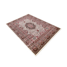 Side angle view of Ivory Paisley Medallion Machine Woven Classic Art Silk Rug by Khushi Living