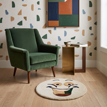 Ivory smiley face hand tufted wool kids rug styled in a playful children's bedroom with modern furniture and colourful decor.
