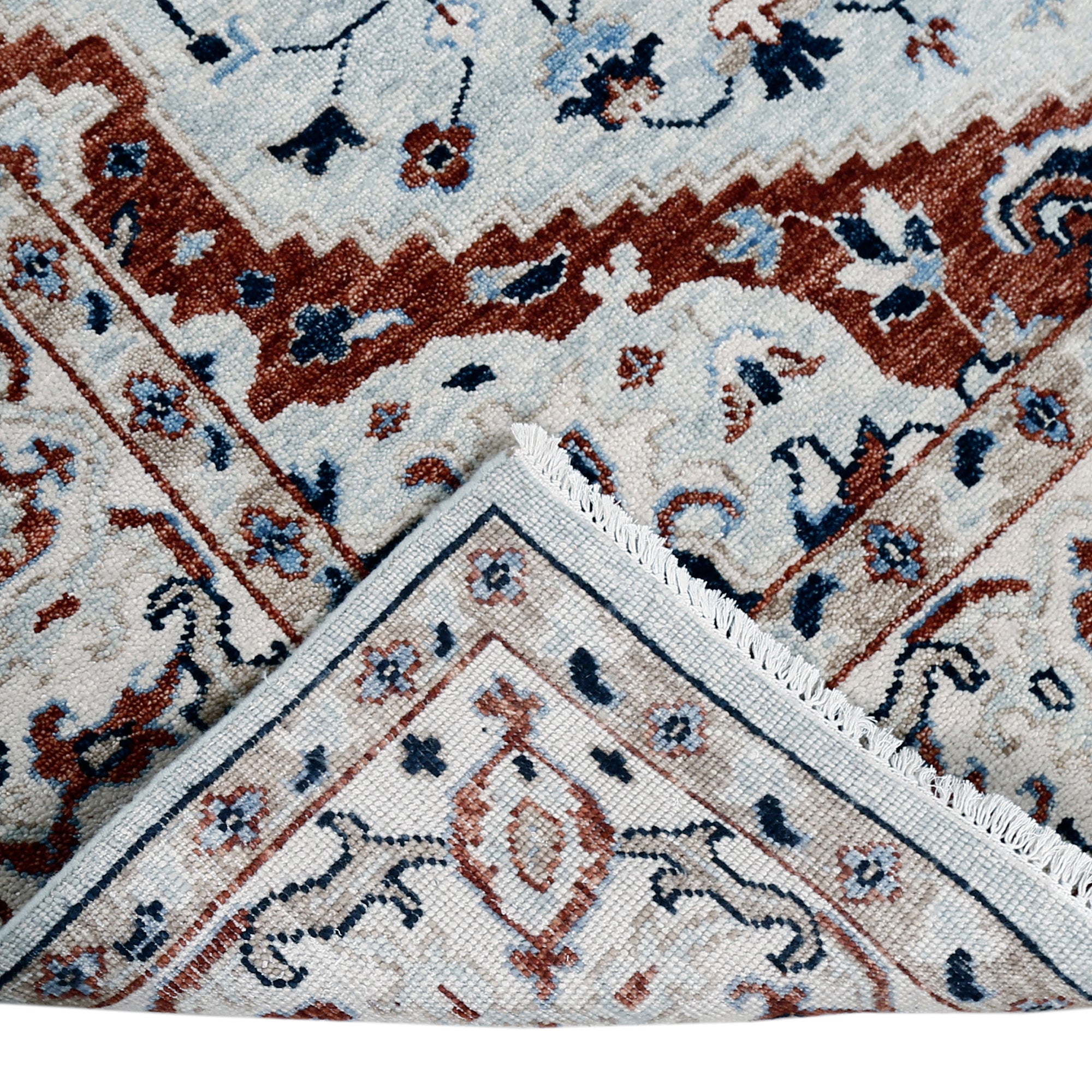 Khushi Living hand knotted traditional wool rug in ivory with classic medallion pattern
