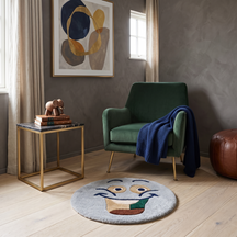 Light blue smiley face hand tufted wool kids rug styled in a playful children’s bedroom with modern furniture and colourful decor.