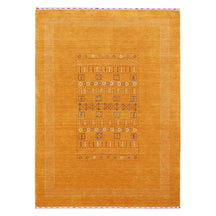Full view of mustard yellow Hand Woven Loom Lori wool rug with multicolour tribal geometric motifs and decorative border