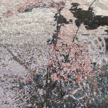 Close-up of the hand knotted wool and viscose texture with charcoal ivory beige and blush abstract detailing