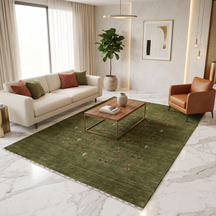 Olive green Hand Woven Loom Lori wool rug with central multicolour tribal folk motifs styled in an earthy contemporary living room