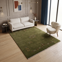 Olive green Hand Woven Loom Lori wool rug with central diamond tribal medallion styled in an earthy contemporary living room