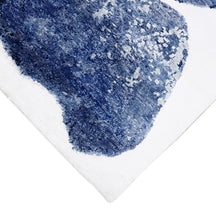 Hand-finished edge and multicolour abstract surface of the Pastel Bloom hand knotted viscose rug