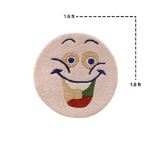 Close-up of pink cheerful face hand tufted wool kids rug highlighting its soft wool texture, plush pile and raised colourful facial details.