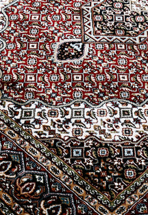 Close-up texture of Red Machine Woven Classic Art Silk Rug showing geometric motifs and smooth Art Silk surface