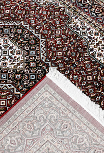 Corner and fringed edge detail of Red Geometric Medallion Machine Woven Classic Art Silk Rug