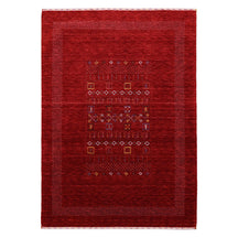 Full view of red Hand Woven Loom Lori wool rug with multicolour tribal geometric motifs and decorative border