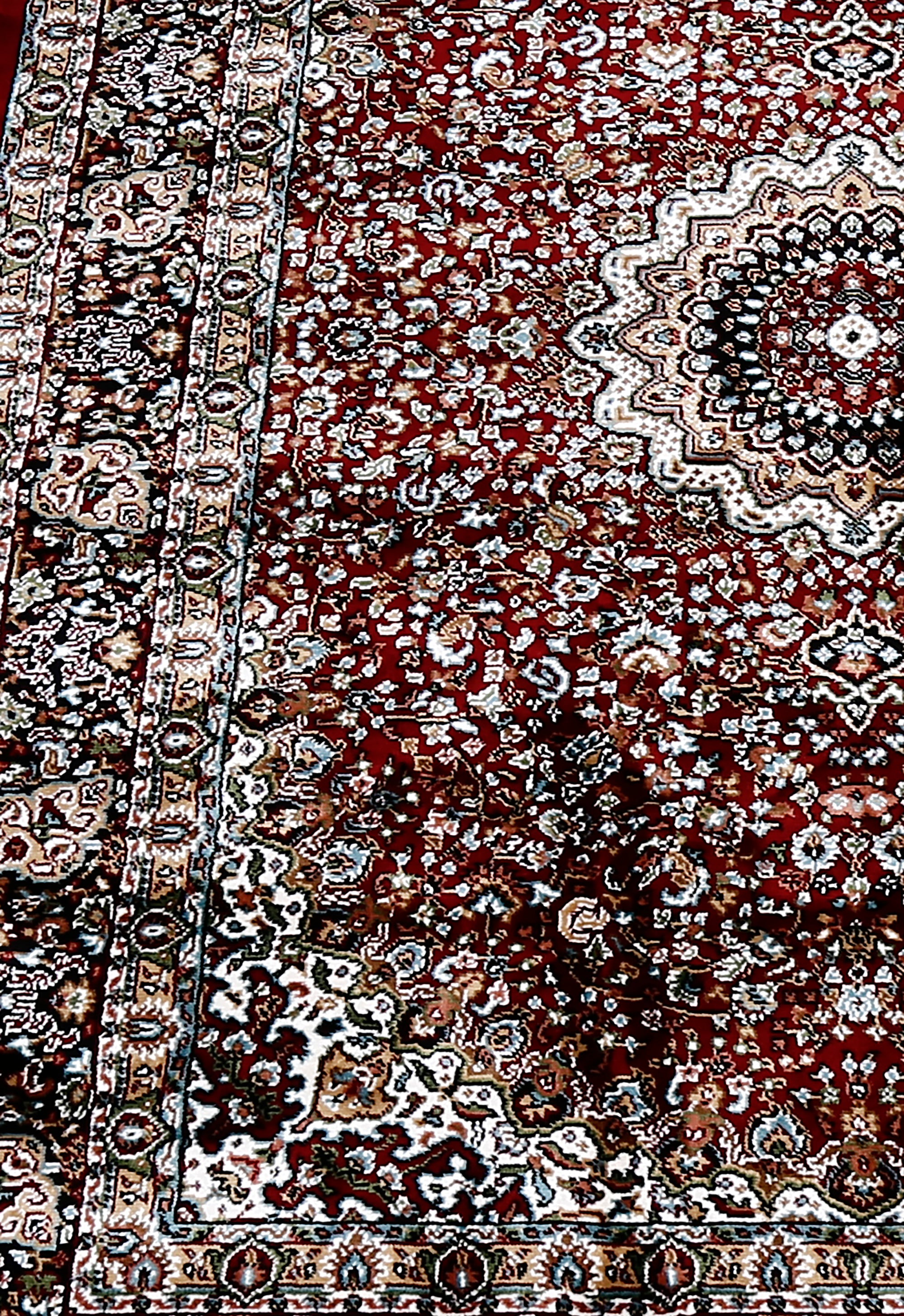 Close-up texture of Red Machine Woven Classic Art Silk Rug showing intricate floral detailing and smooth surface