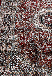 Close-up texture of Red Machine Woven Classic Art Silk Rug showing intricate floral detailing and smooth surface