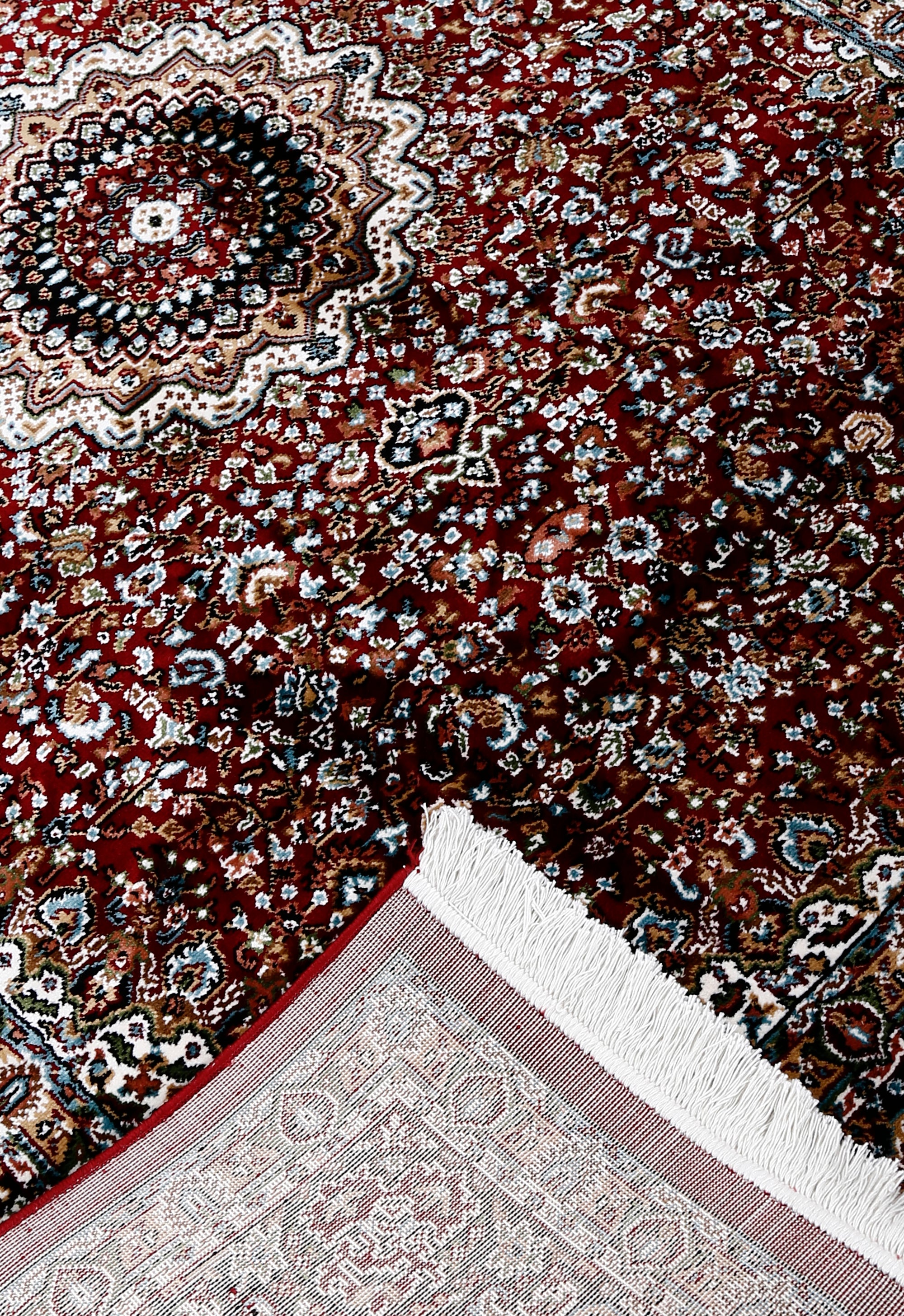 Corner and fringed edge detail of Red Medallion Machine Woven Classic Art Silk Rug