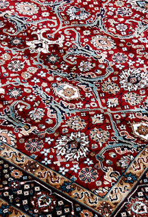 Close-up texture of Red Machine Woven Classic Art Silk Rug showing intricate floral motifs and smooth Art Silk surface