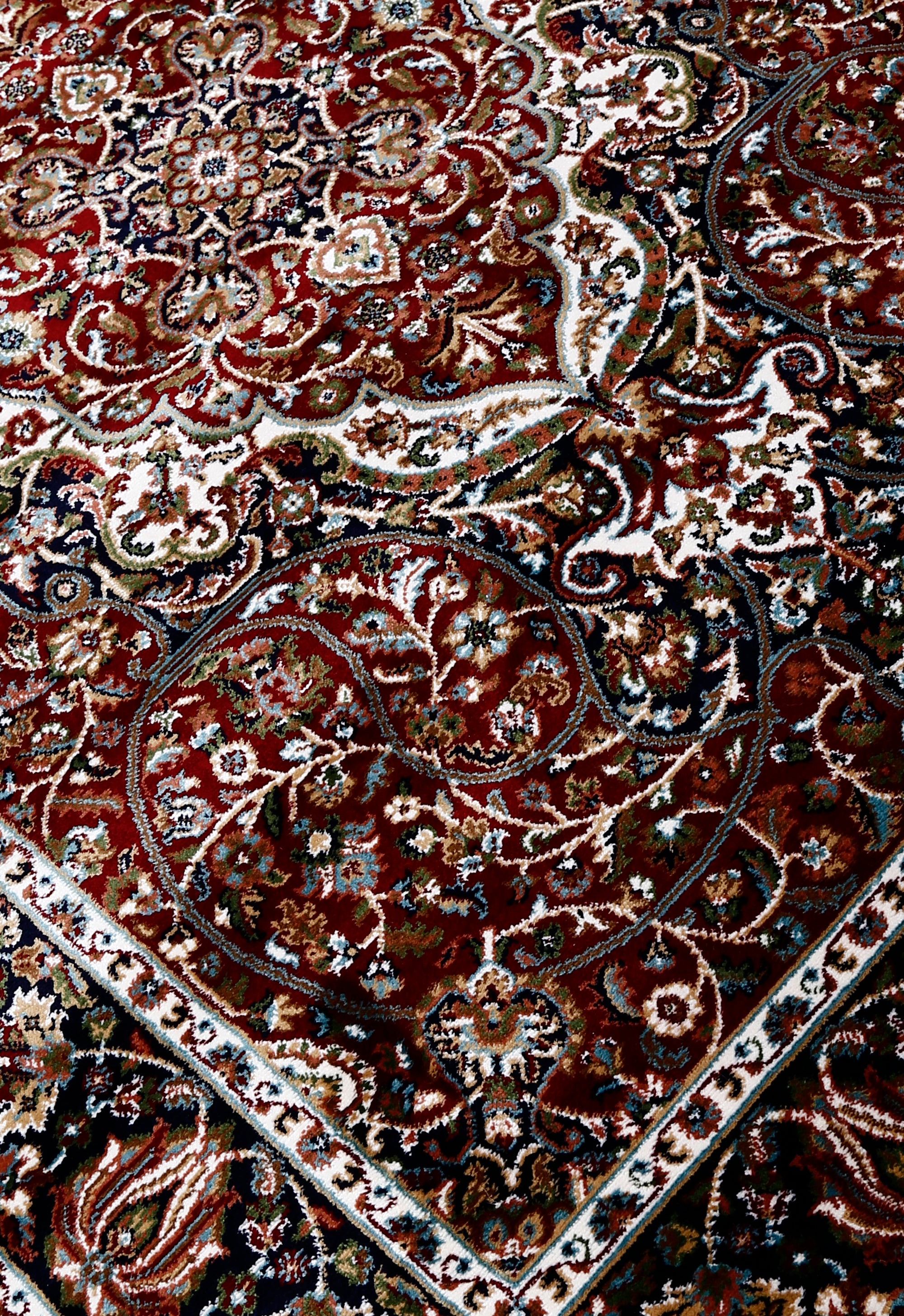 Close-up texture of Red Machine Woven Classic Art Silk Rug showing intricate floral motifs and smooth Art Silk surface
