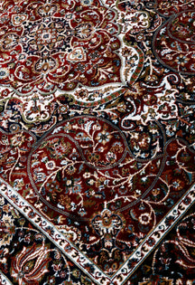 Close-up texture of Red Machine Woven Classic Art Silk Rug showing intricate floral motifs and smooth Art Silk surface