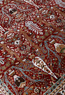 Close-up texture of Red Machine Woven Classic Art Silk Rug showing detailed Tree of Life and floral motifs