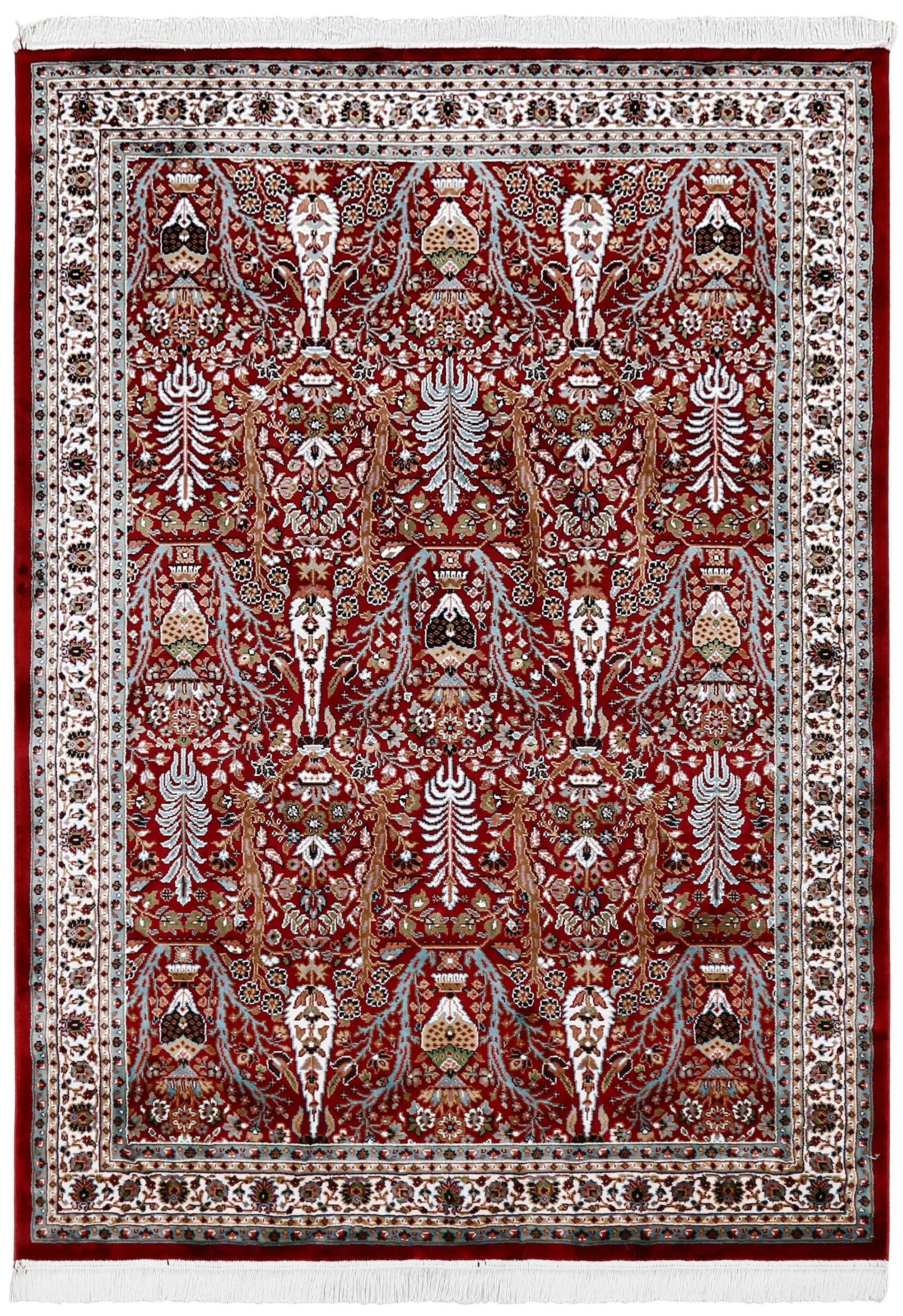 Full view of Red Machine Woven Classic Art Silk Rug with Tree of Life motifs and ivory floral border